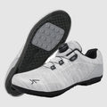White cycling shoes with black soles on a white background