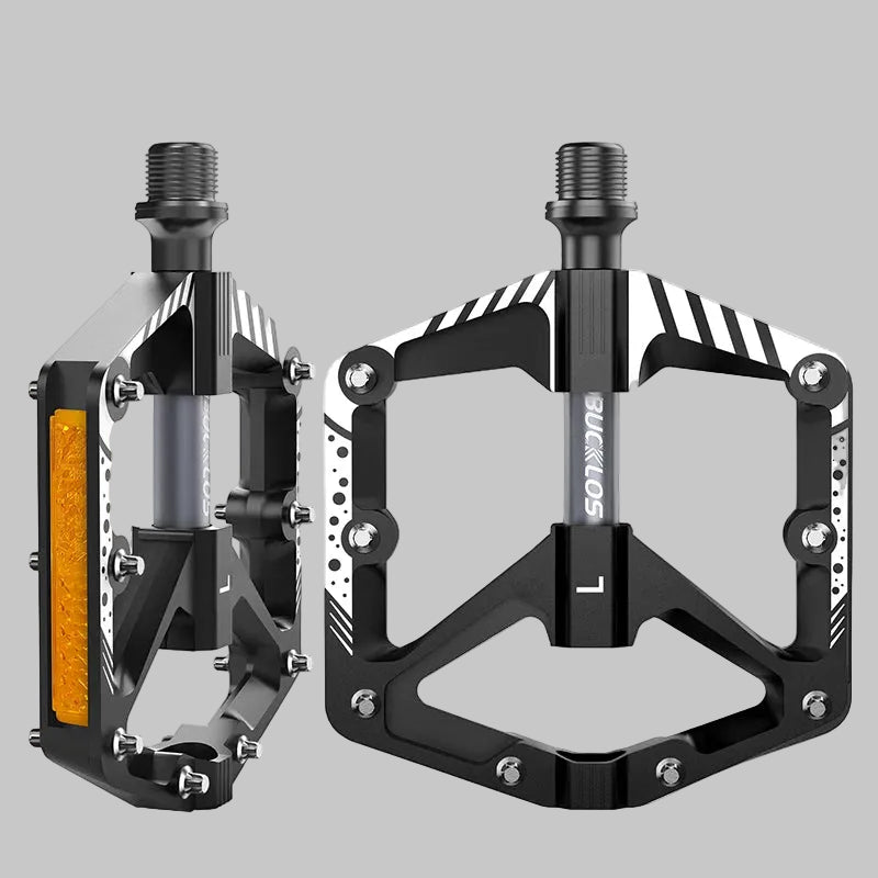 Pair of black bicycle pedals with 'Bucklos' branding on a white background