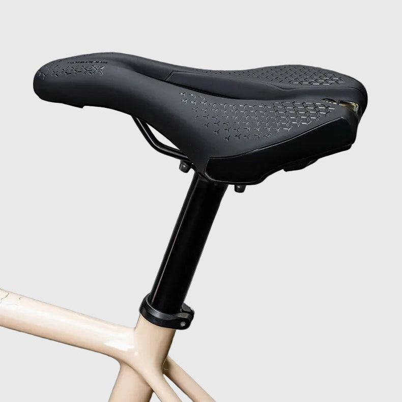 Black bicycle seat on a light gray background