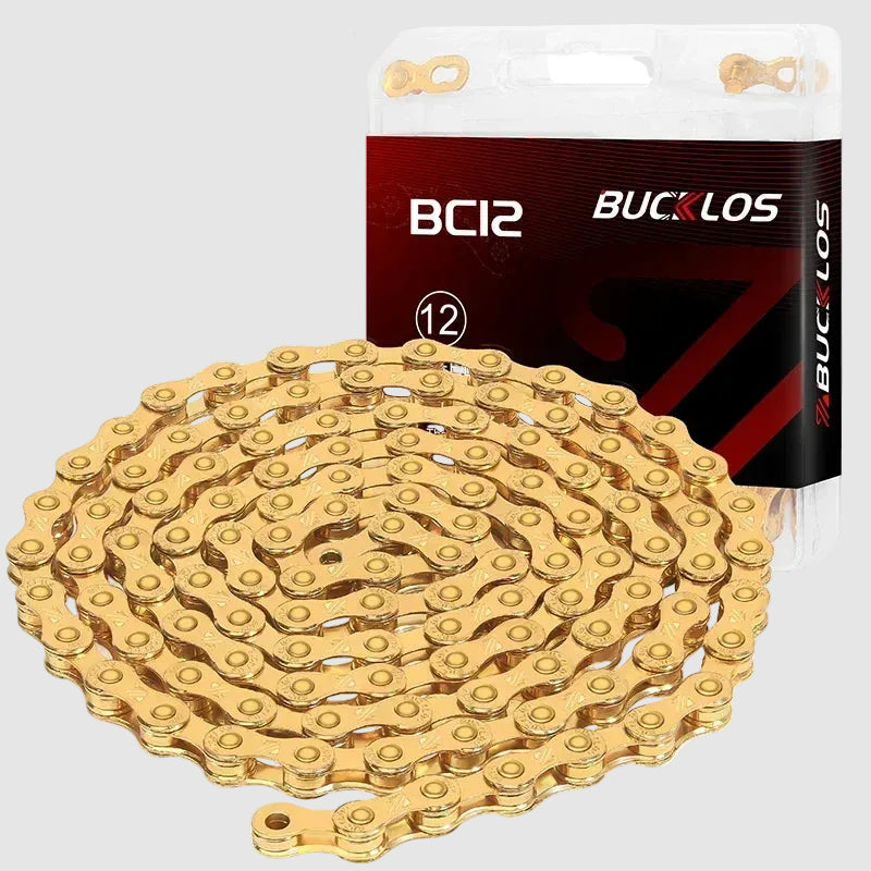 Gold bicycle chain with BUCKLOS packaging on a white background