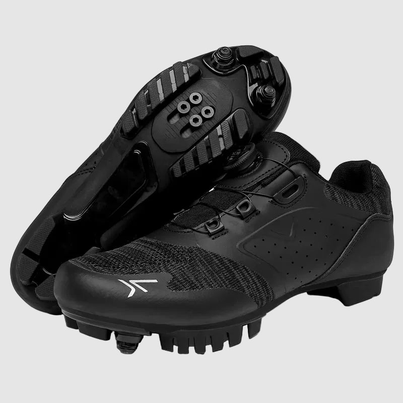 Pair of black cycling shoes with a visible brand logo on a white background