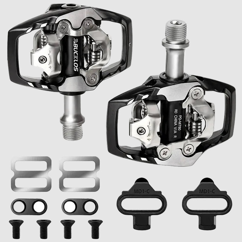 Pair of bicycle pedals with additional components on a white background