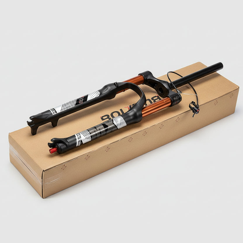 Bicycle fork with black and orange design on a wooden block against a white background